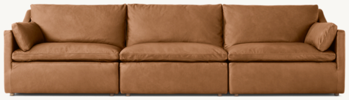 Shown in Cavalo Chestnut; sectional consists of 1 left-arm chair, 1 armless chair and 1 right-arm chair. Cushion configuration may vary by component.