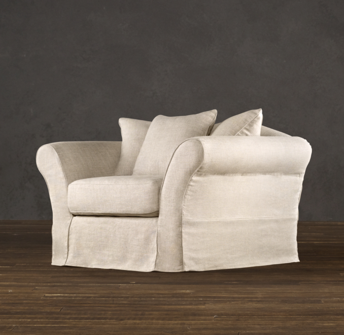 Camelback Slipcovered Swivel Chair