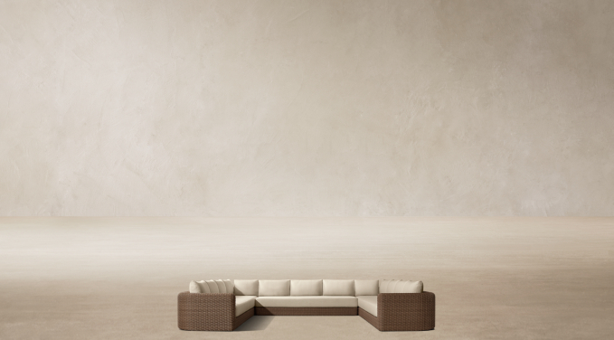 Shown in Brown. Cushions shown in Sand Perennials® Performance Linen Weave; sectional consists of 1 four-seat left-arm return sofa, 1 three-seat armless sofa and 1 four-seat right-arm return sofa.