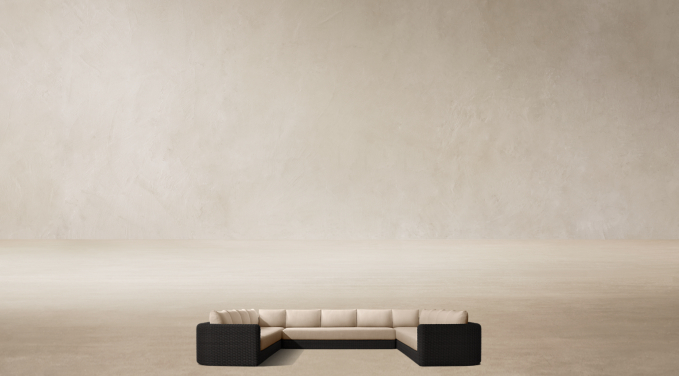 Shown in Black. Cushions shown in Latte Perennials® Performance Linen Weave; sectional consists of 1 four-seat left-arm return sofa, 1 three-seat armless sofa and 1 four-seat right-arm return sofa.