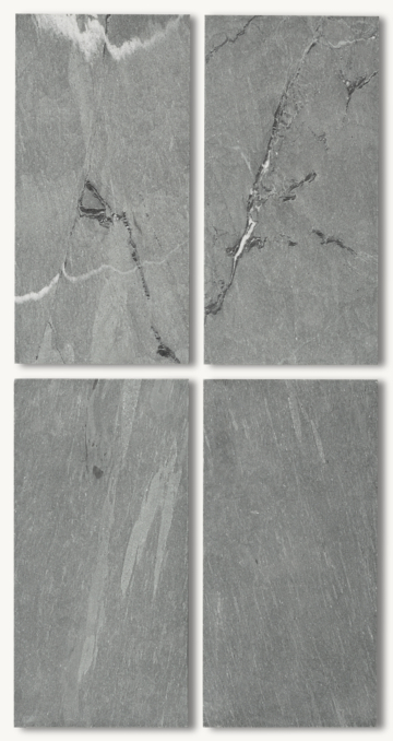 Gray and white marble slabs with natural veining.