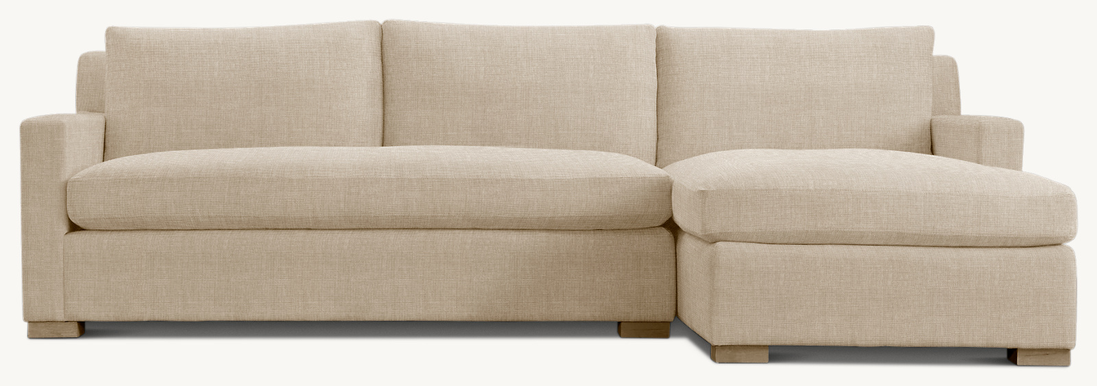 Shown in Sand Belgian Linen; sectional consists of 1 left-arm sofa and 1 right-arm chaise. Cushion configuration may vary by component.