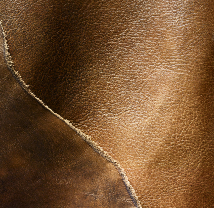 Shown in Italian Eaton Cocoa. Masterfully hand burnished to achieve a patina with distinctive highs and lows that capture and reflect the light. Variations in color and texture make each piece unique.