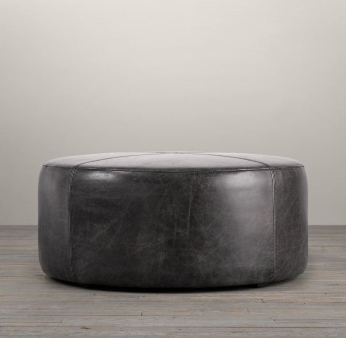 round gray leather ottoman with storage