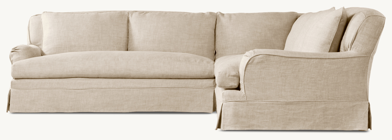 Shown in Sand Belgian Linen; sectional consists of 1 left-arm sofa, 1 corner chair and 1 right-arm sofa. Cushion configuration may vary by component.