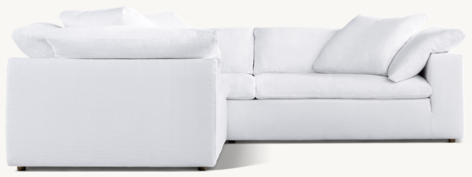 Shown in White Washed Belgian Flax Linen; sectional consists of 1 left-arm sofa and 1 sofa. Cushion configuration may vary by component.