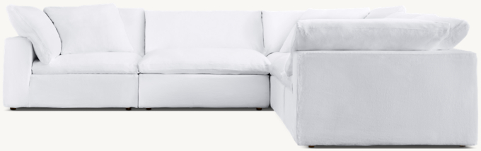 Shown in White Belgian Linen; sectional consists of 3 corner chairs and 2 armless chairs. Cushion configuration may vary by component.