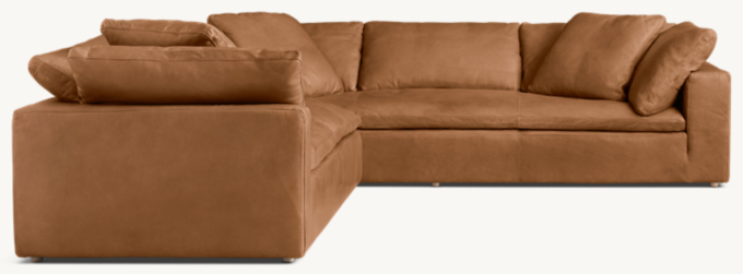 Shown in Italian Cavallino Chestnut; sectional consists of 1 left-arm sofa and 1 sofa. Cushion configuration may vary by component.