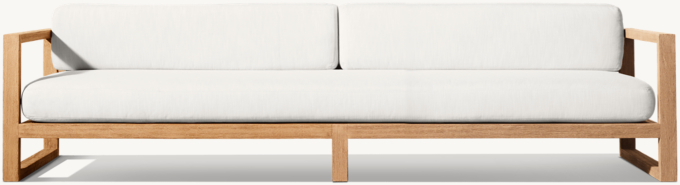 112&#34; Luxe sofa shown in Natural Teak. Cushions shown in White Perennials&#174; Performance Textured Linen Weave.