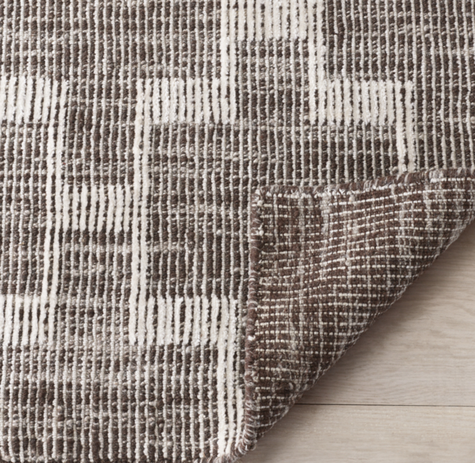 Hand woven from undyed wool and finely spun nylon.