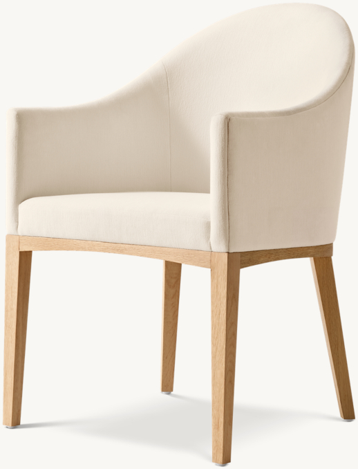 Three Quarter view of Konrad Fabric Dining Armchair 