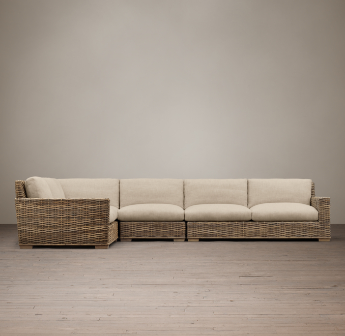 Front view of Antilles Rattan Customizable Sectional 
