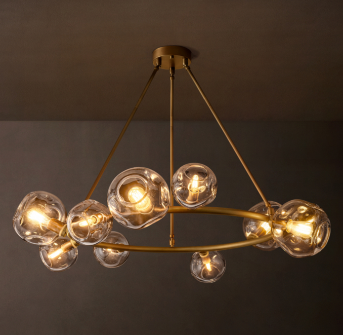 122cm chandelier shown in Lacquered Burnished Brass.