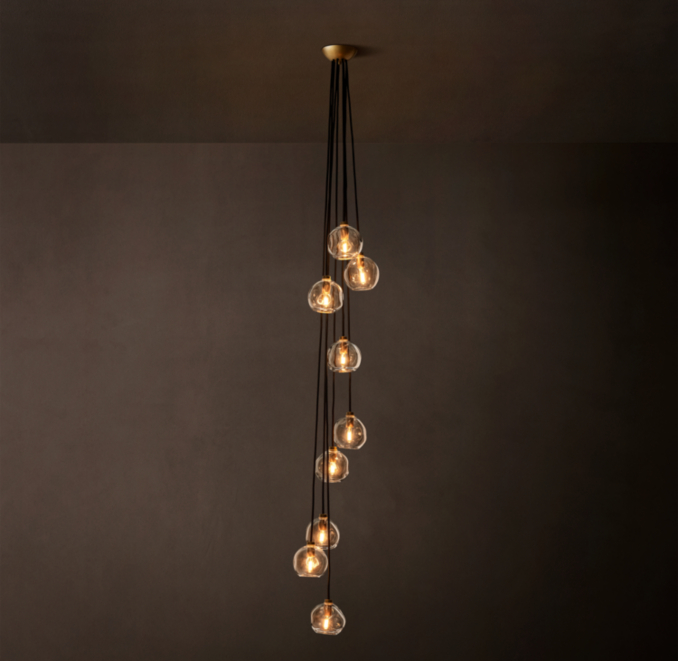 9-globe pendant shown in Lacquered Burnished Brass.