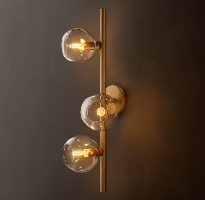 Shown in Lacquered Burnished Brass.