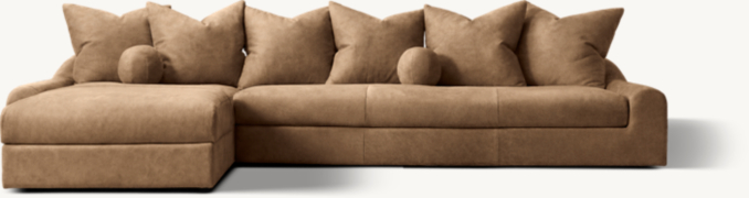 Shown in Italian Varenna Suede Tan; sectional consists of 1 left-arm chaise and 1 right-arm sofa. Number of scatterback pillows may vary by component.