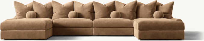 Shown in Italian Varenna Suede Tan; sectional consists of 1 left-arm chair, 2 armless chairs, 1 right-arm chair and 2 end-of-sectional ottomans.
