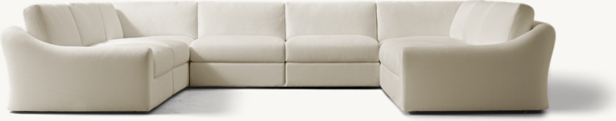 Shown in Natural Performance Washed Linen; sectional consists of 1 left-arm chair, 4 armless chairs, 2 corner chairs and 1 right-arm chair. Cushion configuration may vary by component.