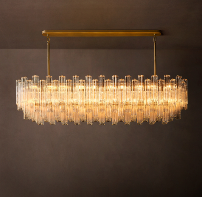 86" chandelier shown in Lacquered Burnished Brass.
