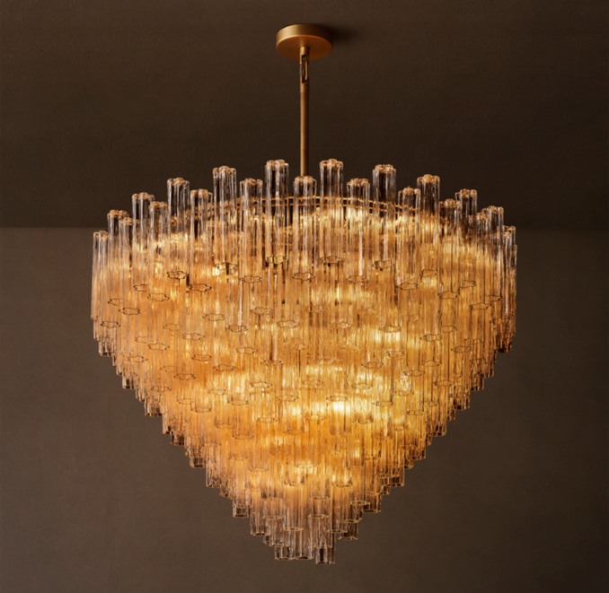 61" chandelier shown in Lacquered Burnished Brass.