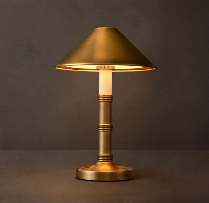 Shown in Lacquered Burnished Brass.