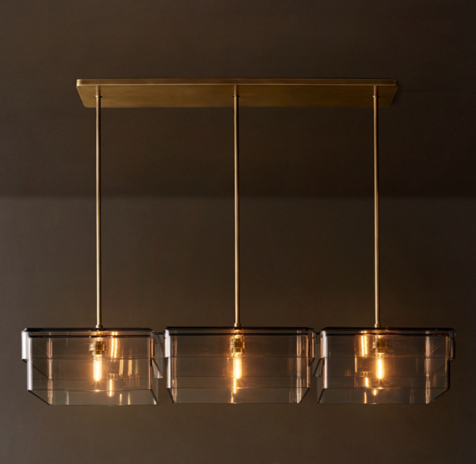 55" chandelier shown in Lacquered Burnished Brass.