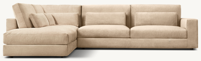 Shown in Sand Performance Velvet; this Classic configuration includes 1 left open chaise, 1 modular corner chair and 1 right-arm sofa. All Classic configurations include lumbar pillows; cushion configuration may vary by component.