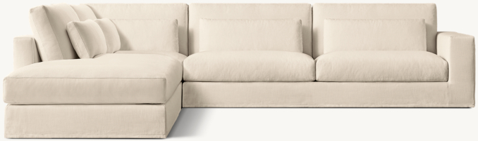 Shown in Natural Perennials® Performance Textured Linen Weave; Classic sectional consists of 1 left open chaise, 1 modular corner chair and 1 right-arm sofa. All Classic configurations include lumbar pillows.
