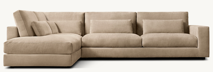 Shown in Italian Veneto Smoke; this Classic configuration includes 1 left open chaise, 1 modular corner chair and 1 right-arm sofa. All Classic configurations include lumbar pillows; cushion configuration may vary by component.