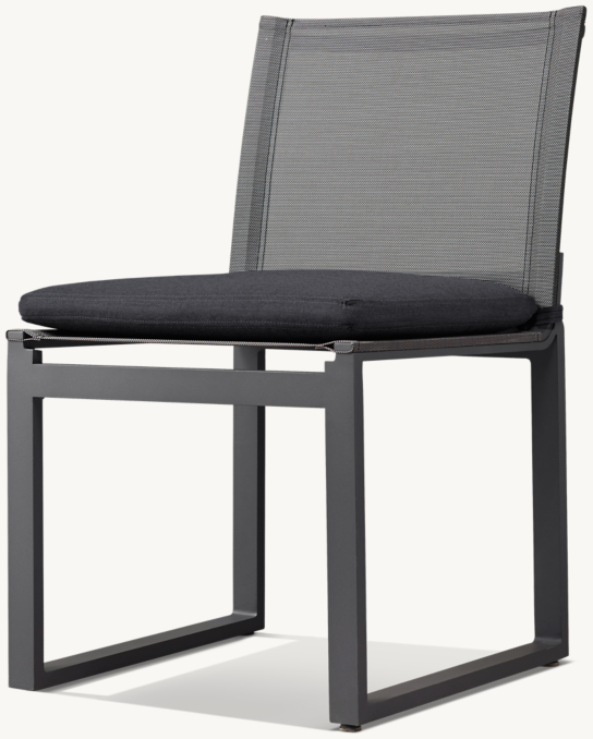 Three Quarter view of Aegean & Mesh Dining Side Chair Cushions shown in Slate With Perennials Canvas - Charcoal