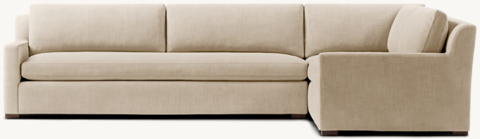 Shown in Sand Belgian Linen; sectional consists of 1 left-arm return sofa and 1 right-arm sofa. Cushion configuration may vary by component.