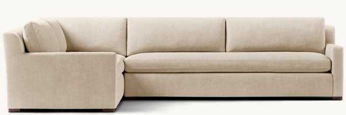 Shown in Sand Belgian Linen; sectional consists of 1 left-arm return sofa and 1 right-arm sofa.