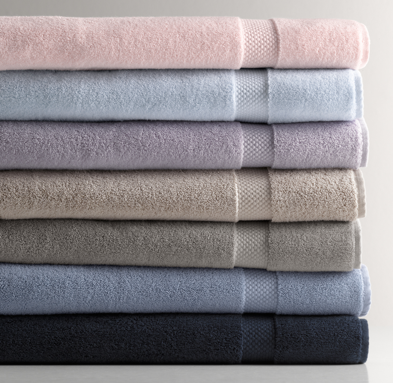Shown (top to bottom) in petal, cloud, lilac, dove, grey, marine and navy.