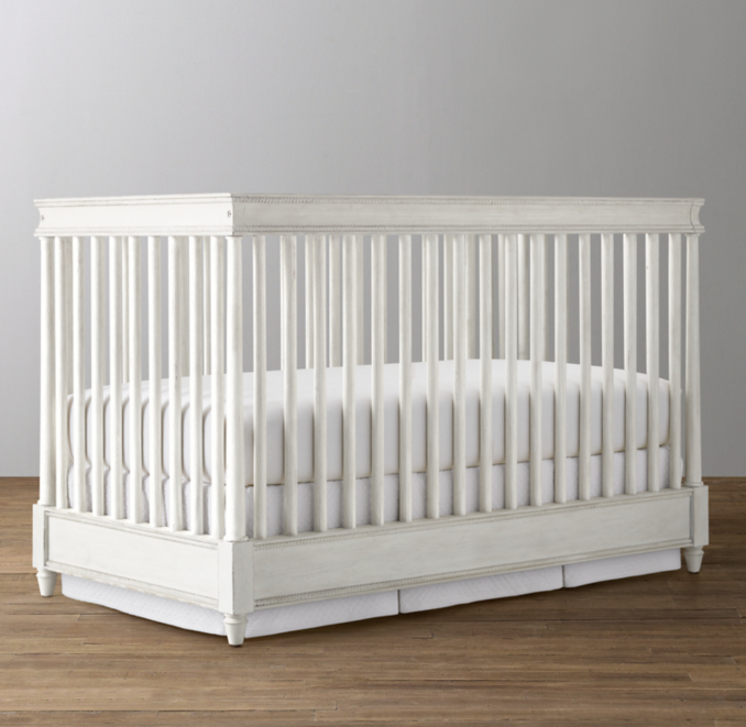 Three Quarter view of Airin Low-Profile Spindle Crib 