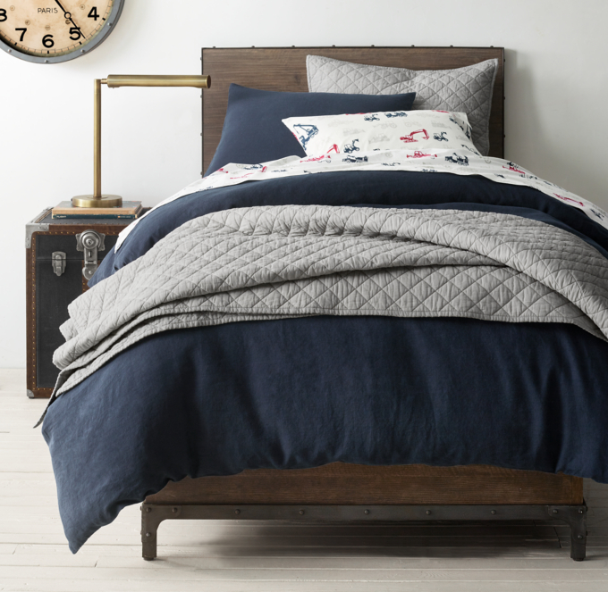 Duvet cover and sham shown in Navy. Quilt and quilted sham shown in Grey.