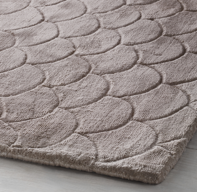 Silky, plush pile is hand sheared to a &#189;&#34; height with hand-carved scallop detail.