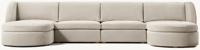 Shown in Dove Performance Velvet; sofa consists of 1 left-arm chaise, 2 armless chairs, 1 right-arm chair and 1 ottoman.