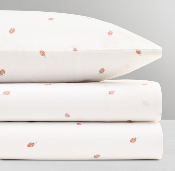 Shown in Multi Watercolor Strawberry Organic Cotton.