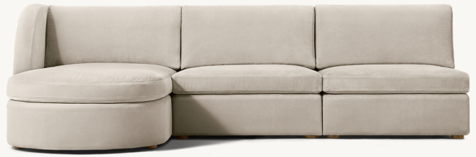 Shown in Dove Performance Velvet; sofa consists of 1 left-arm chaise and 2 armless chairs. 