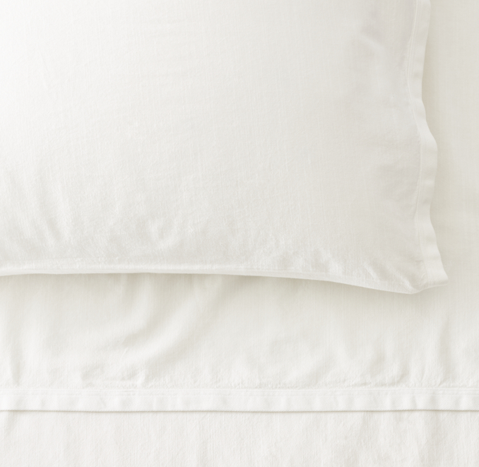 Overhead view of Garment-Dyed Vintage Cotton Fitted Sheet shown in Ivory