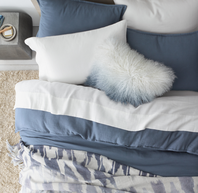 Duvet cover and sham shown in Midnight. Sheet set shown in White.