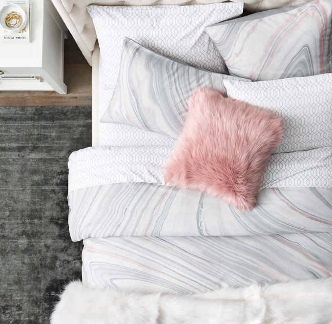 Duvet cover, shams and decorative pillow cover shown in Dusty Rose. Sheet set shown in Grey. Throw shown in White.