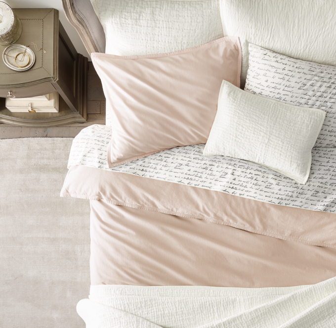 Duvet cover and sham shown in Blush. Sheet set shown in Charcoal. Quilt and quilted shams shown in Ivory.