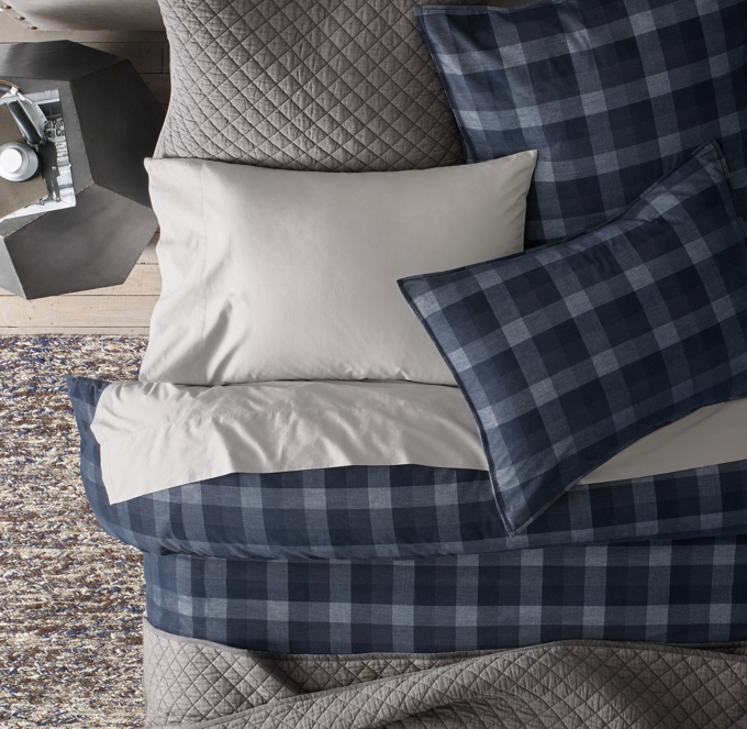 Sham shown in Navy. Sheet set shown in Grey. Quilt and quilted sham shown in Charcoal.