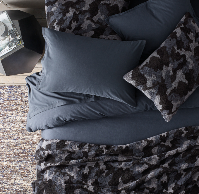 Duvet cover, shams and sheet set shown in Navy. Bed throw and shams shown in Grey.