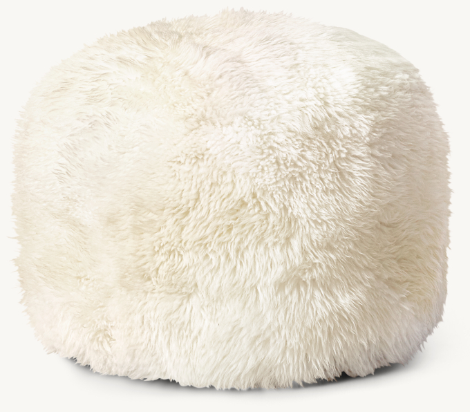 Three Quarter view of New Zealand Sheepskin Round Pouf - White 